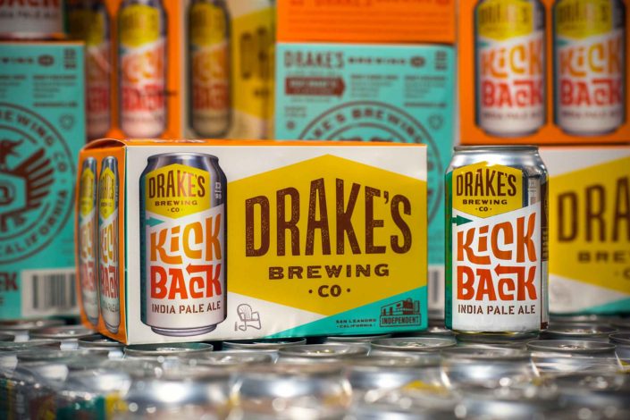 Cans and a six pack of Kick Back IPA by Drake's Brewing